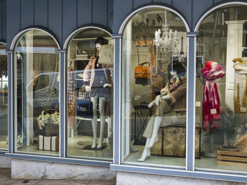 Ground-floor retail building on historic Flagler Street — arched storefront windows