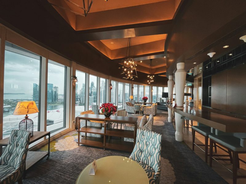 Bayfront two-bedroom with marina and Dinner Key views — living room