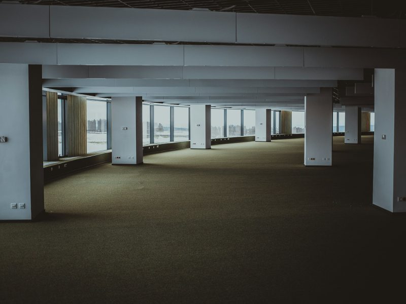 Mural-wrapped warehouse with creative-office approvals — open warehouse floor