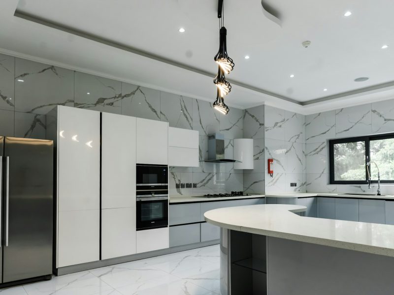 Furnished one-bedroom steps from Ocean Drive — kitchen