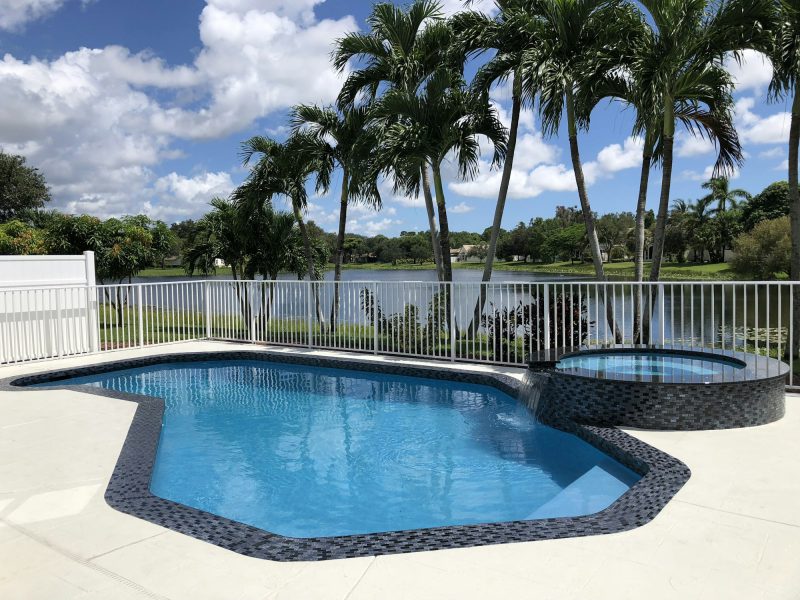 Las Olas Isles waterfront with no-bridge ocean access — pool and garden