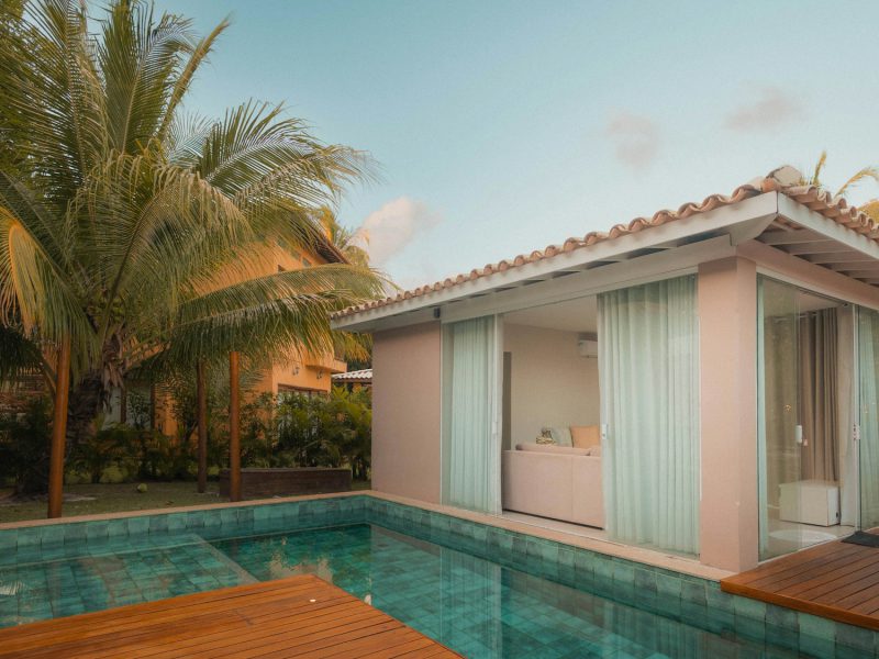 North Bay Road estate with a Biscayne Bay sunset dock — pool and garden