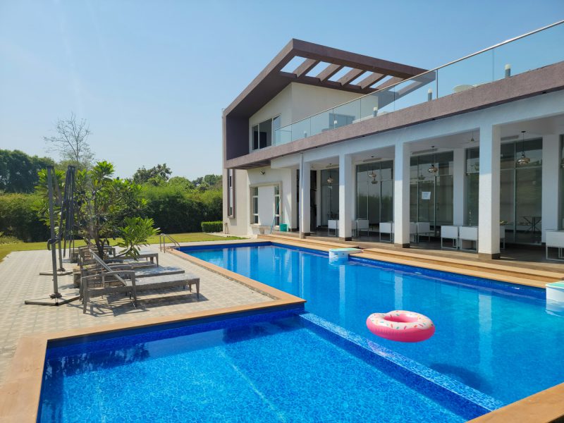 Normandy Isle waterfront ranch with a private dock — pool and garden