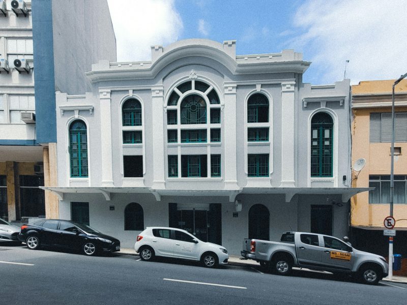 Ground-floor retail building on historic Flagler Street — the 1925 masonry building
