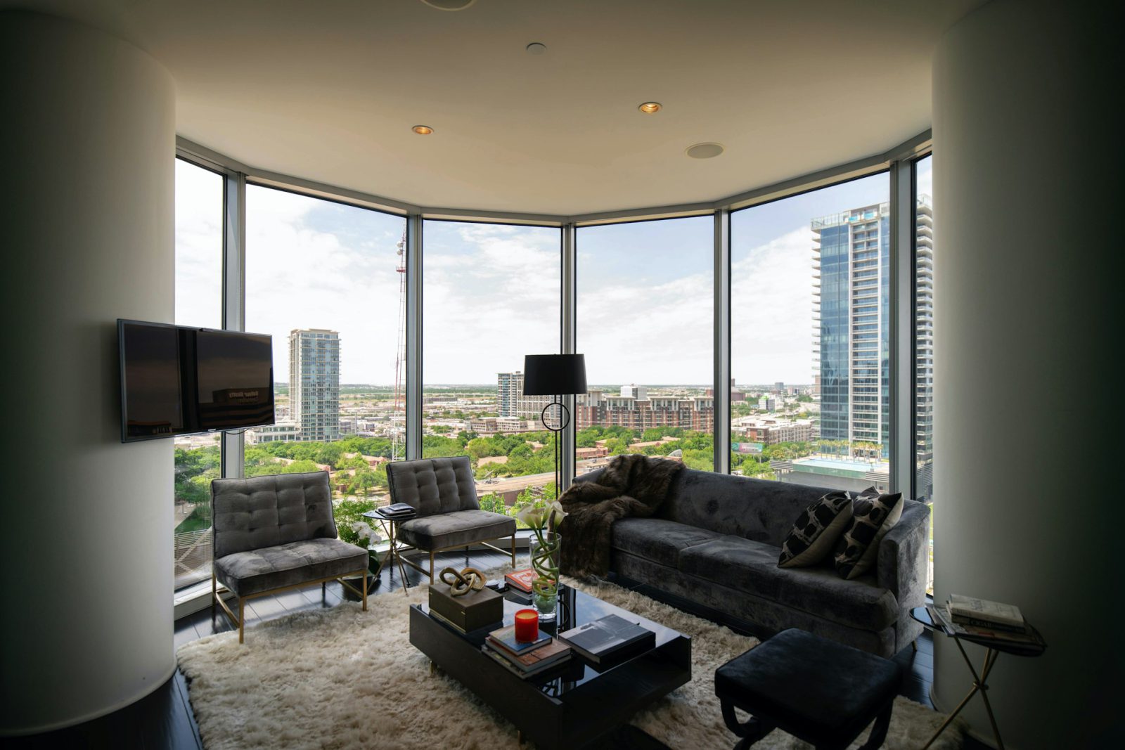 Double-height loft steps from the Metromover — living area
