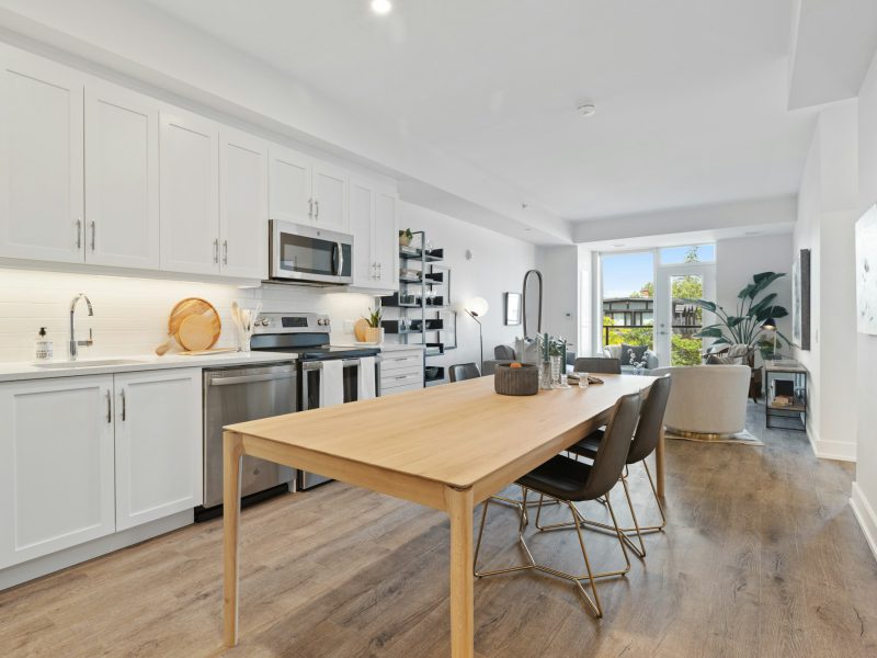 Brand-new townhouse on a tree-lined Gables street — dining area