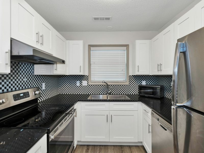 Oceanfront one-bedroom on the Mid-Beach boardwalk — kitchen