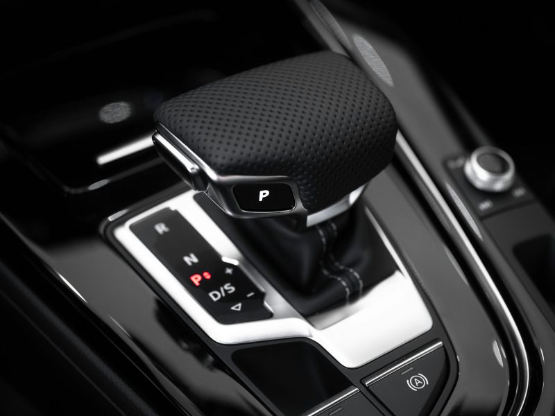 Black and silver car gear shift lever