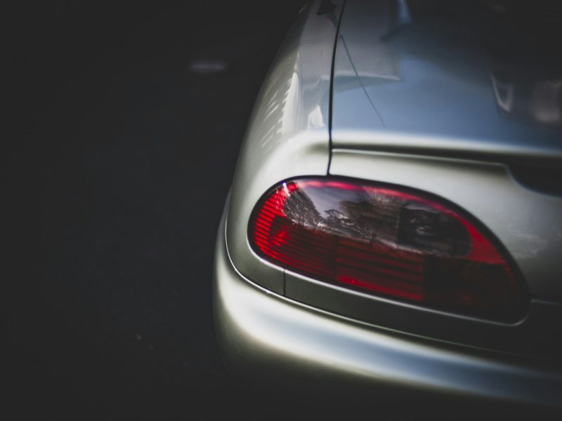 Close-up of a silver car's taillight