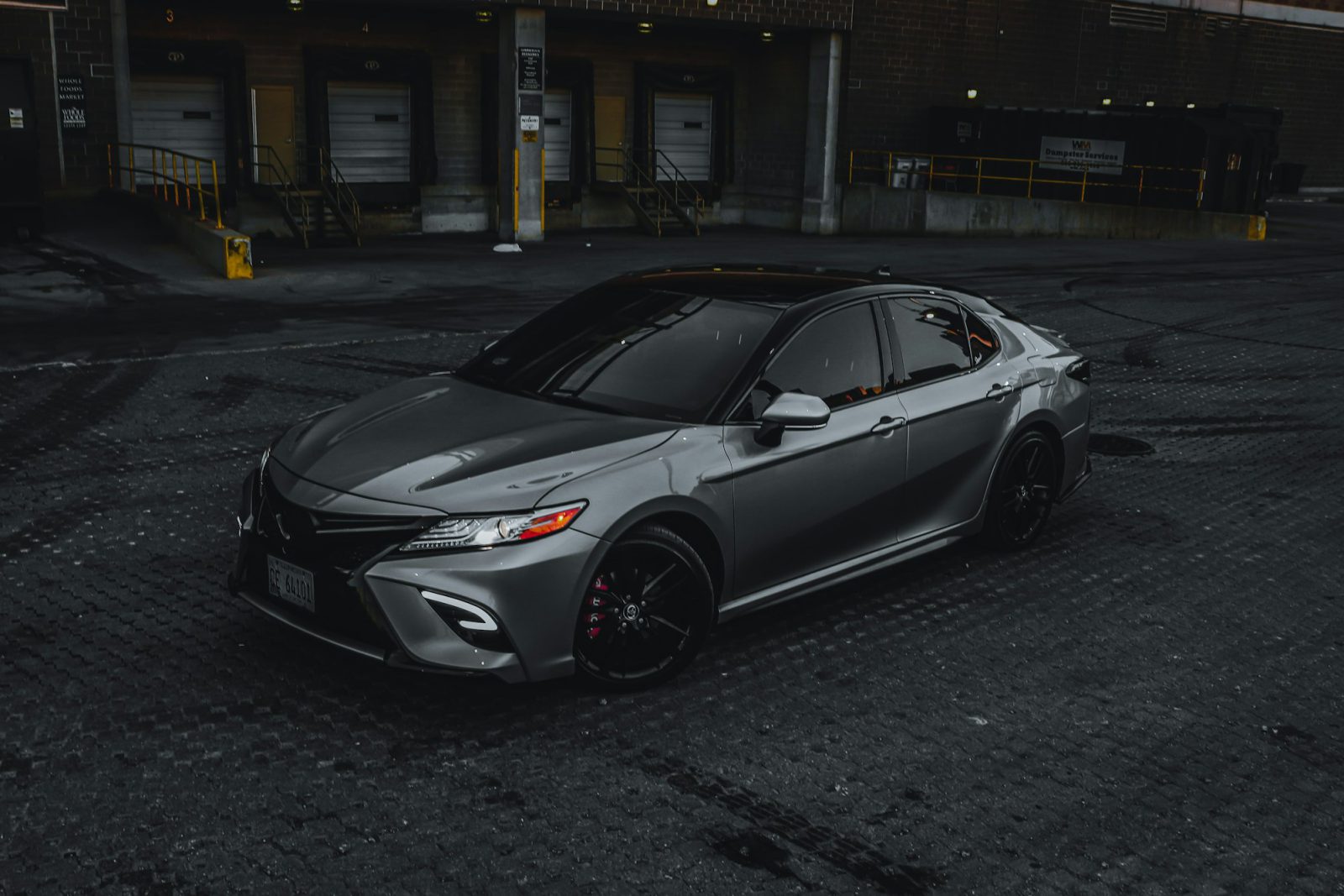Gray Toyota Camry, front three-quarter view