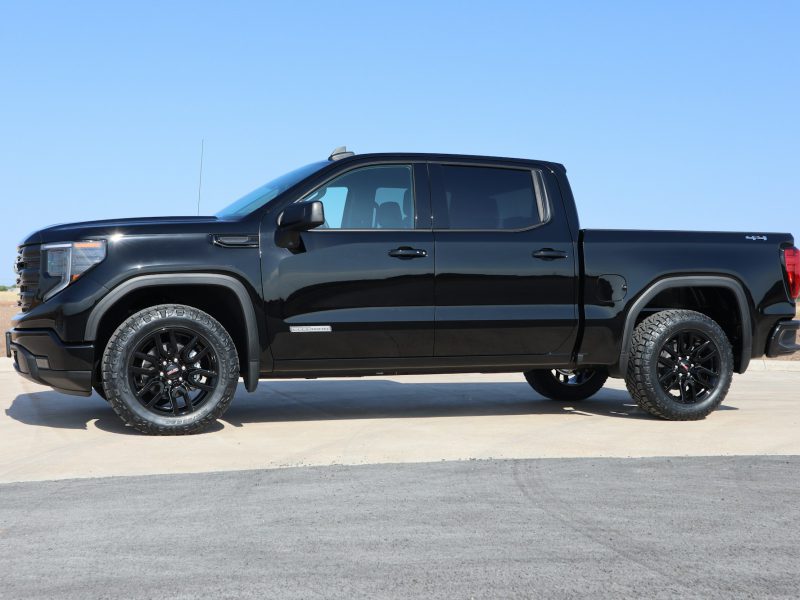 Black GMC Sierra, side profile