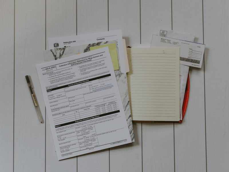 Stack of papers flat lay photography