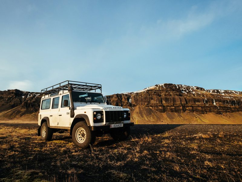 White Land Rover Defender, front three-quarter view