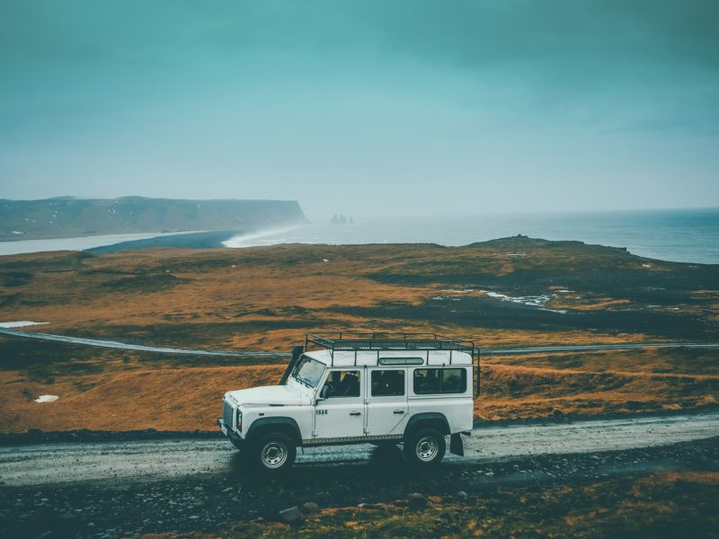 White Land Rover Defender, side profile