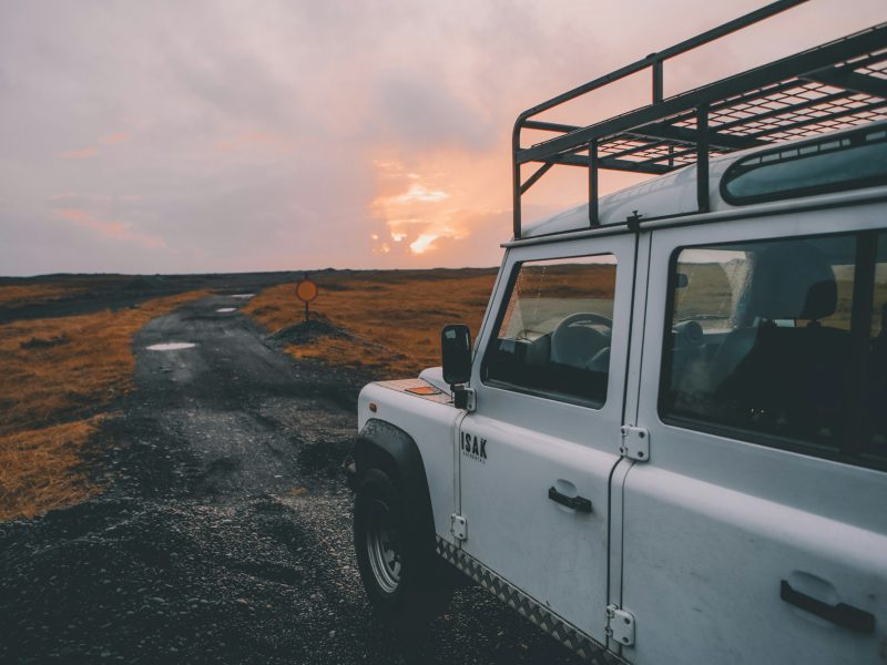 White Land Rover Defender, side profile