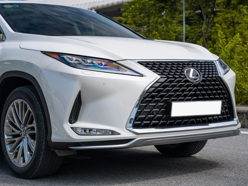 White Lexus RX, front three-quarter view