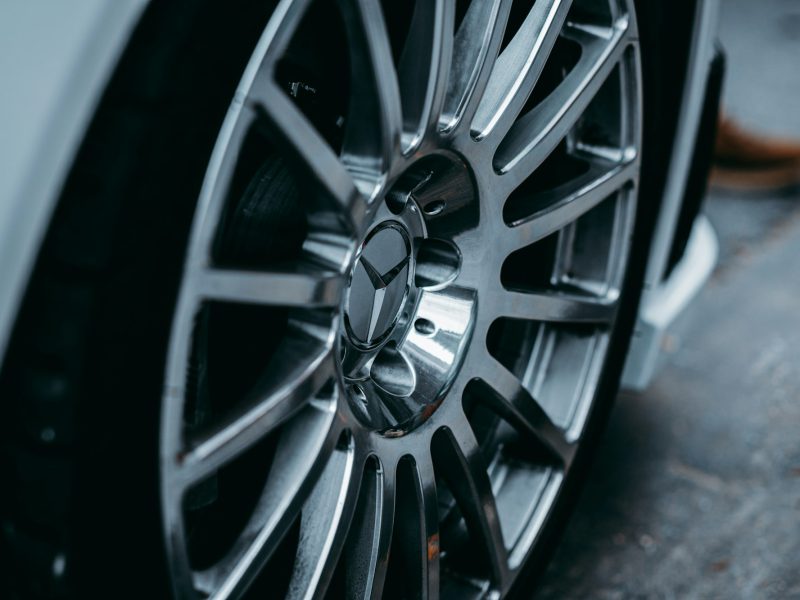 A close up of a wheel on a car