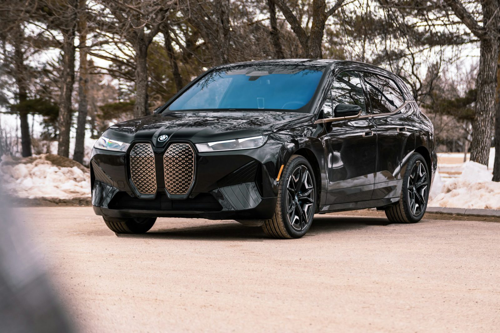 Black BMW iX, front three-quarter view