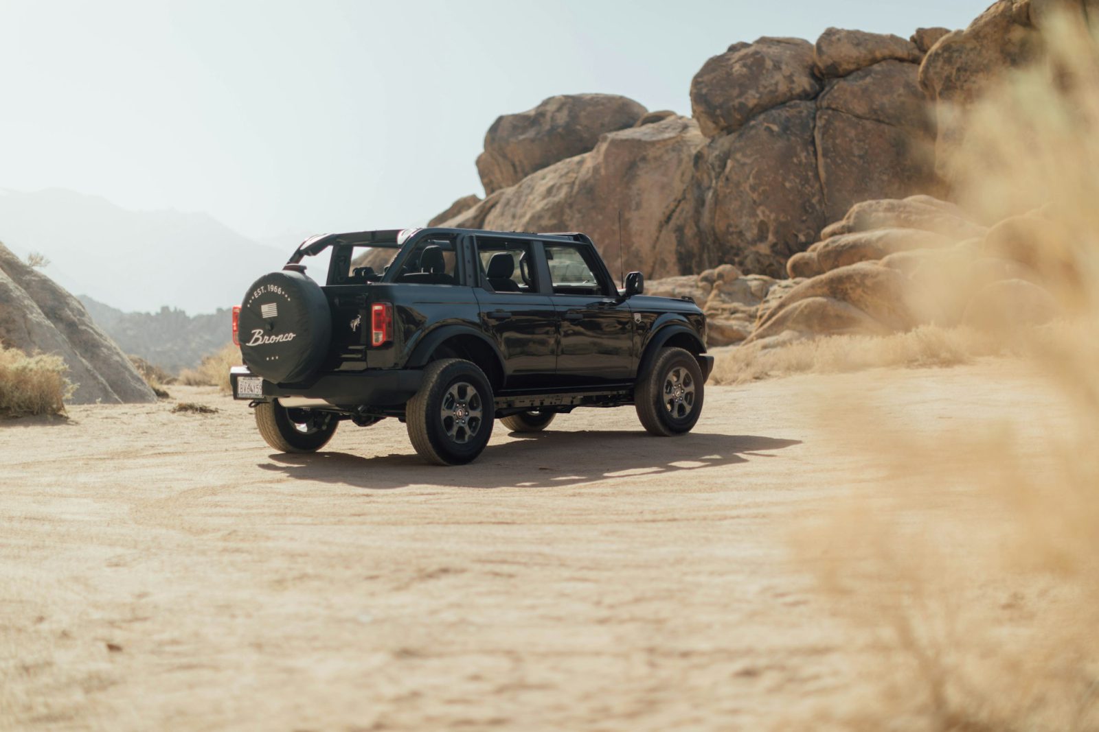 Black Ford Bronco, rear three-quarter view