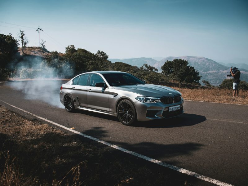 Gray BMW M5, front three-quarter view