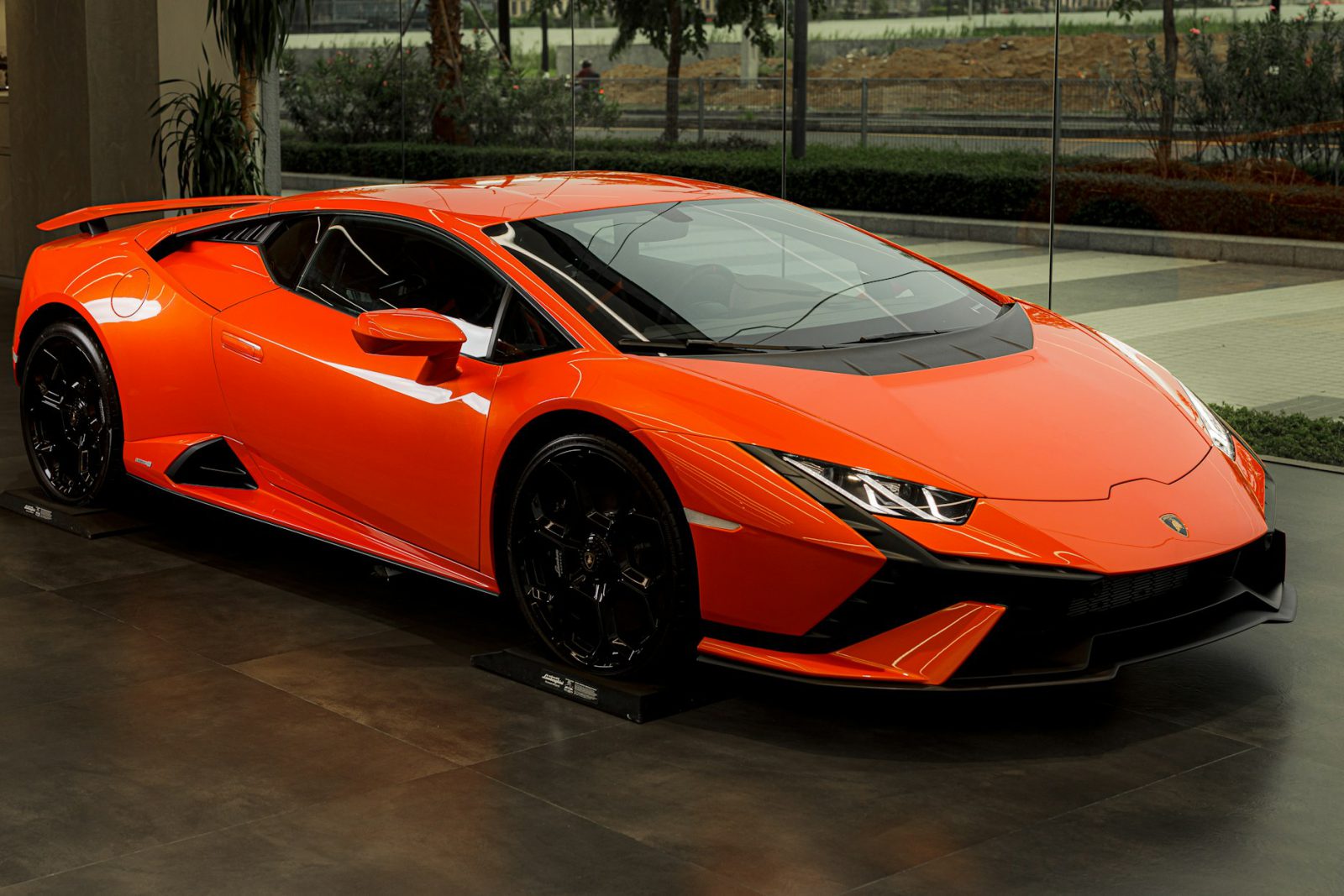 Orange Lamborghini Huracan, front three-quarter view
