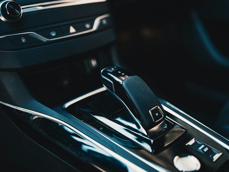 Shallow focus photography of car shift lever