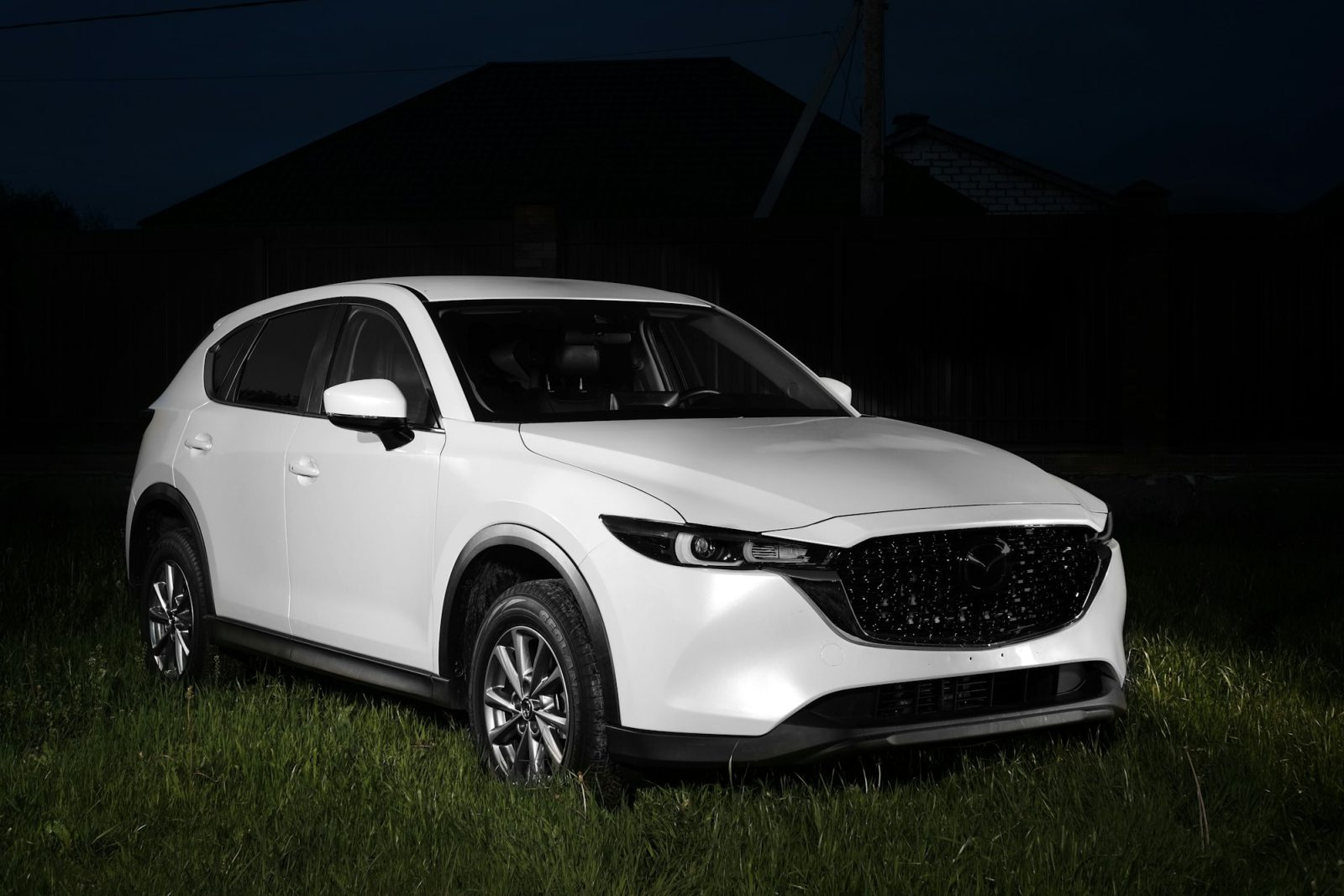 White Mazda CX-5, front three-quarter view