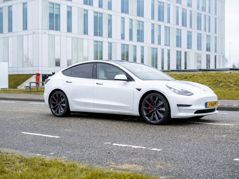 White Tesla Model 3, front three-quarter view