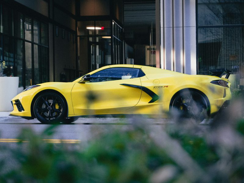Yellow Chevrolet Corvette, front three-quarter view