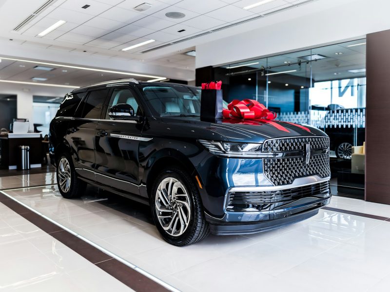 Black Lincoln Navigator, front three-quarter view