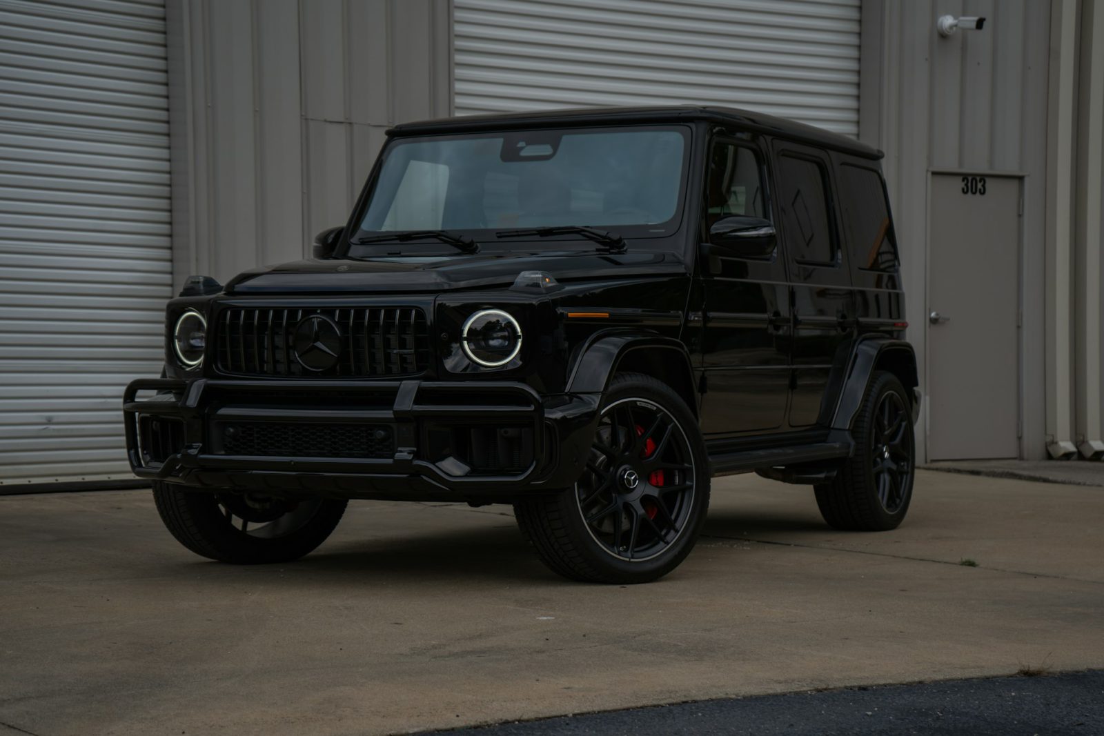 Black Mercedes-Benz G-Class, front three-quarter view