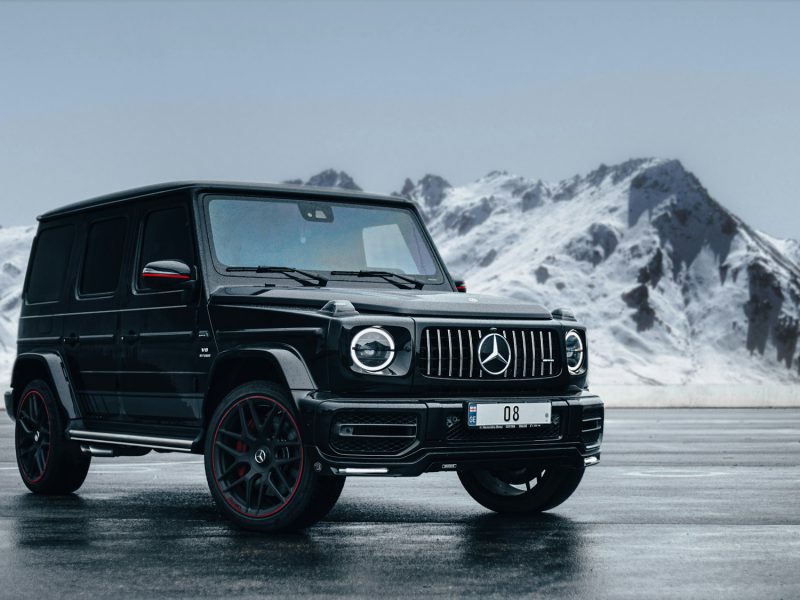 Black Mercedes-Benz G-Class, front three-quarter view