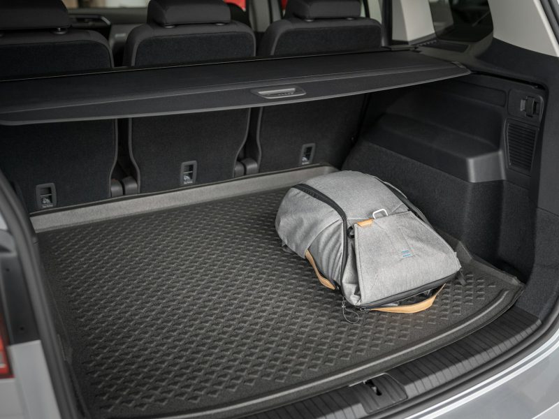 Cargo area with a protective liner and a bag