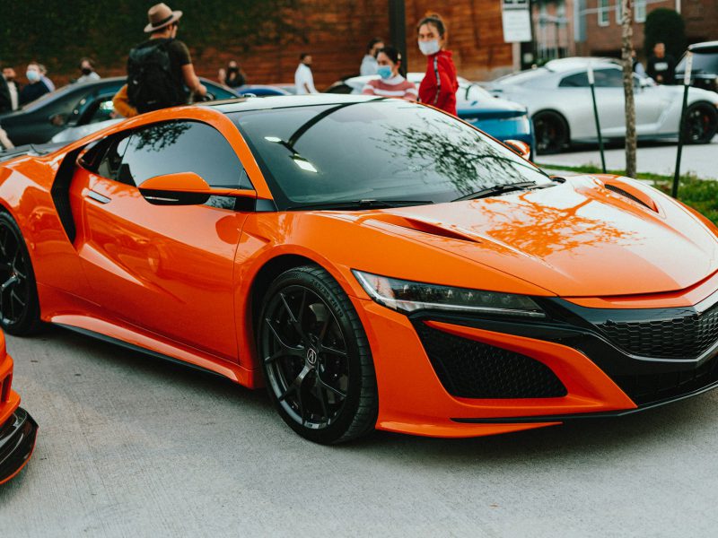 Orange Acura NSX, front three-quarter view