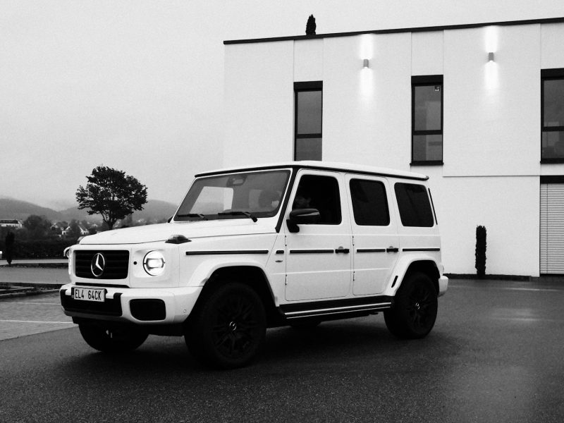 White Mercedes-Benz G-Class, front three-quarter view