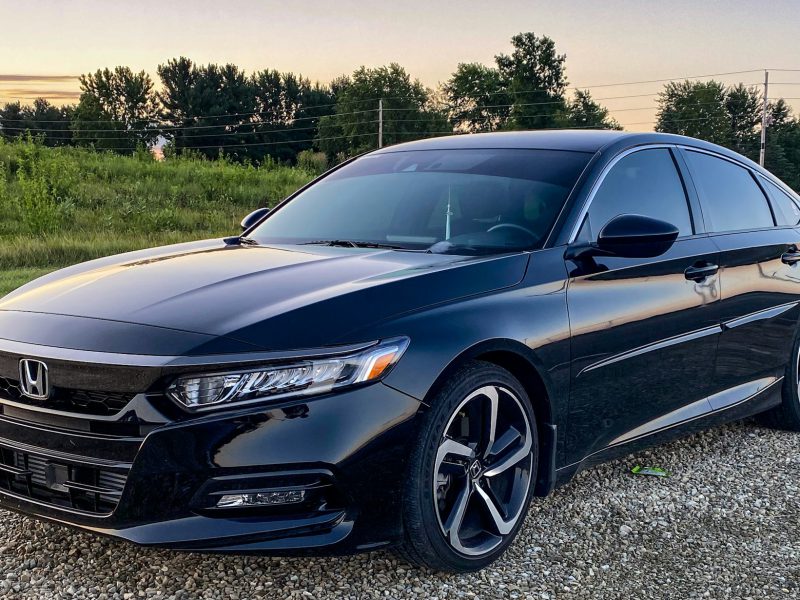 Black Honda Accord, front three-quarter view