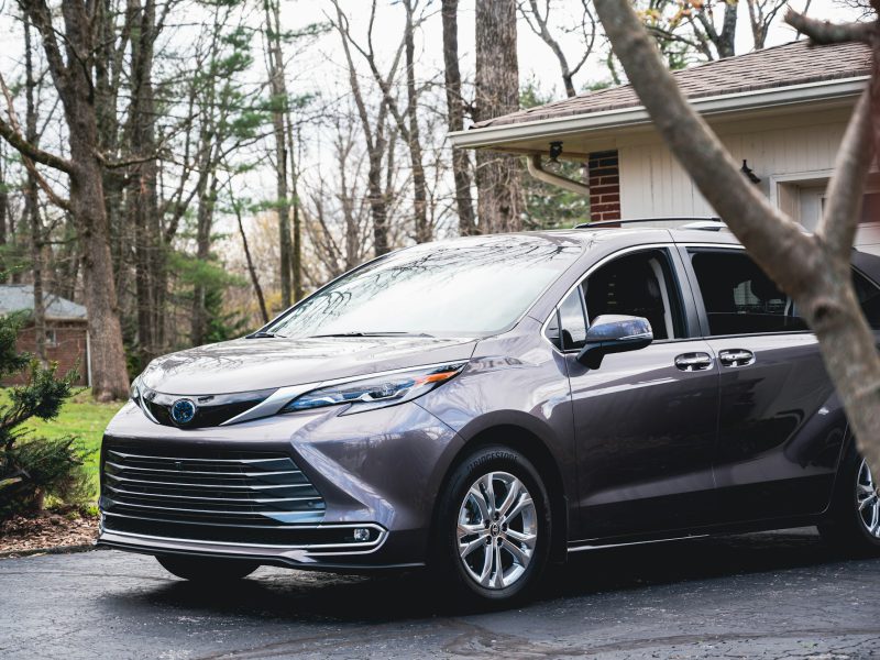 Gray Toyota Sienna, front three-quarter view