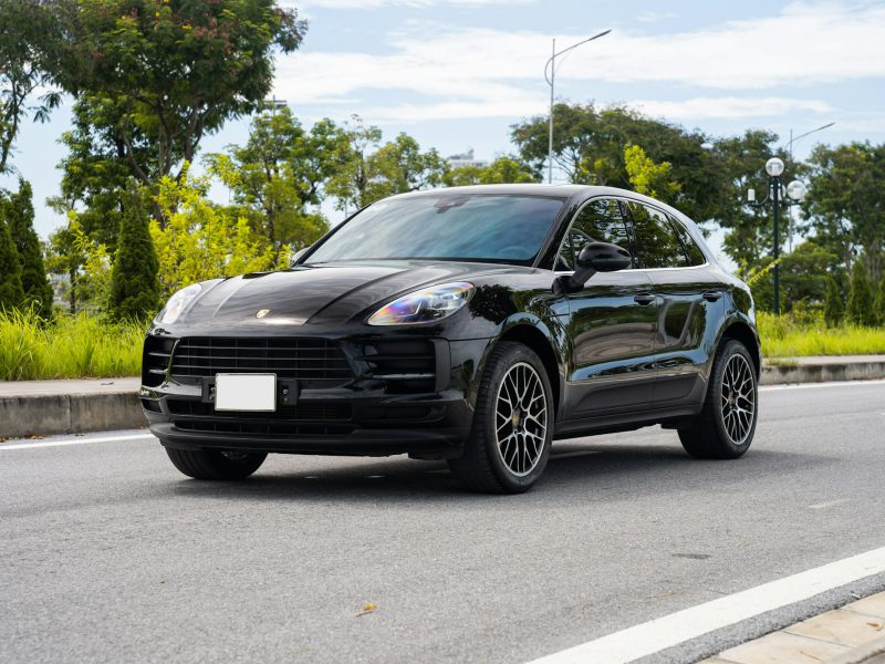 Black Porsche Macan, front three-quarter view
