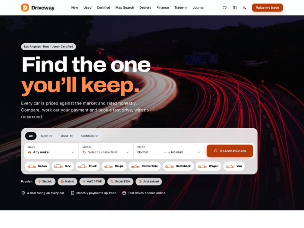 The Driveway demo front page: make, model and budget search over a dark cinematic hero, featured cars and a night-mode toggle (car dealer WordPress theme)